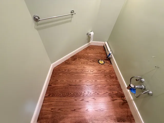 White oak refinishing and bathroom installation in Wayland, Massachusetts