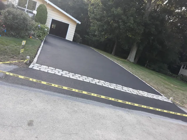 work photo from asphaltdrivewaysolutions.com