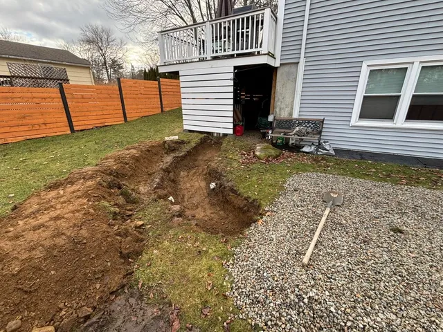 Heavy equipment on a residential excavation job site near Hampton, NH