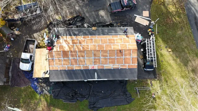 aerial-house-construction-roof-sheathing.webp
