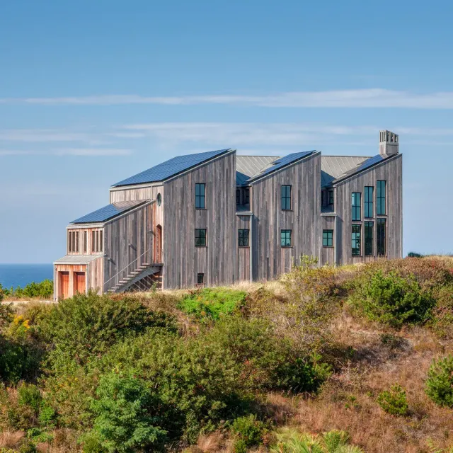 A new house for a special site atop a bluff, with a panoramic view across the bay and of Provincetown’s skyline, is designed around the sun.
