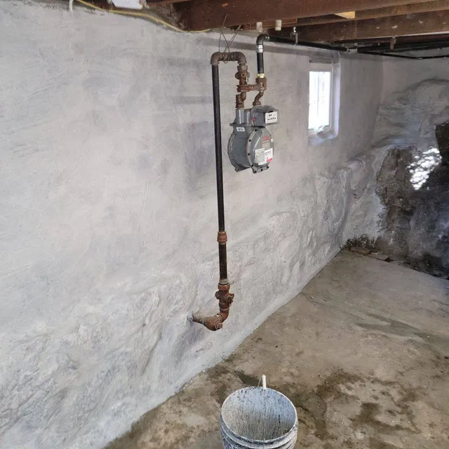 Parged and sealed basement foundation wall