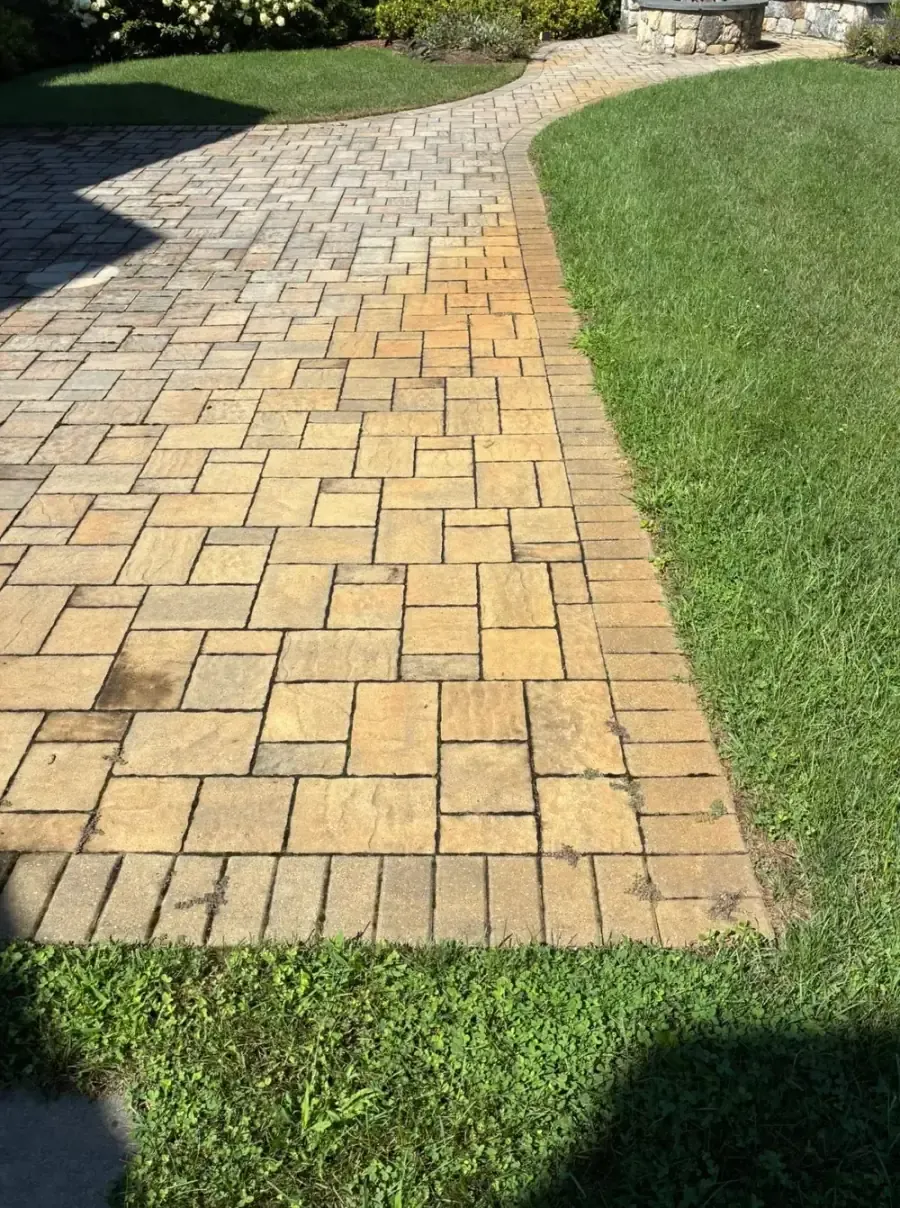 Before Irrigation Rust Stain Removal from a Paver Patio in Worcester County, MA — Pro Pressure Washing