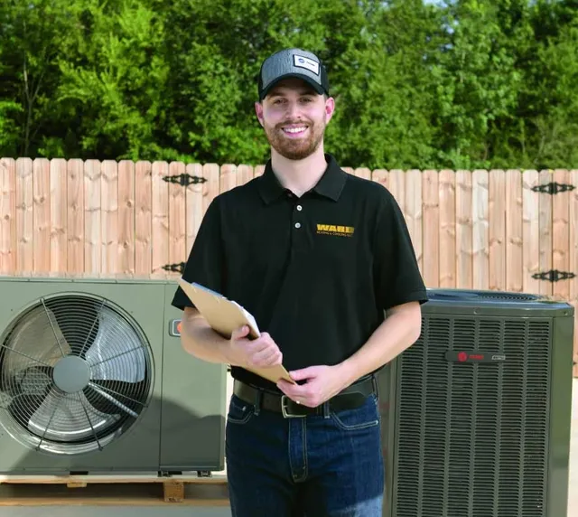 3379788479052-havc-technician-with-new-equipment-sm.jpg