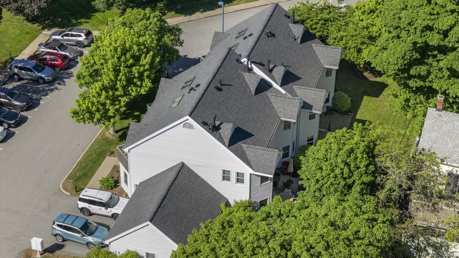 MassTech Roofing Modernizes Oceanfront Condo in Hull with Roof and Skylight Upgrades