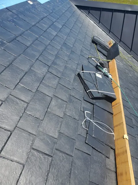 work photo from newroofingandsiding.com