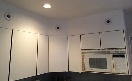 High velocity HVAC system round outlets mounted on wall