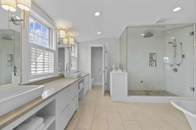 view of a custom designed bathroom with a walk-in shower