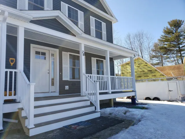 White seamless gutters on front porch