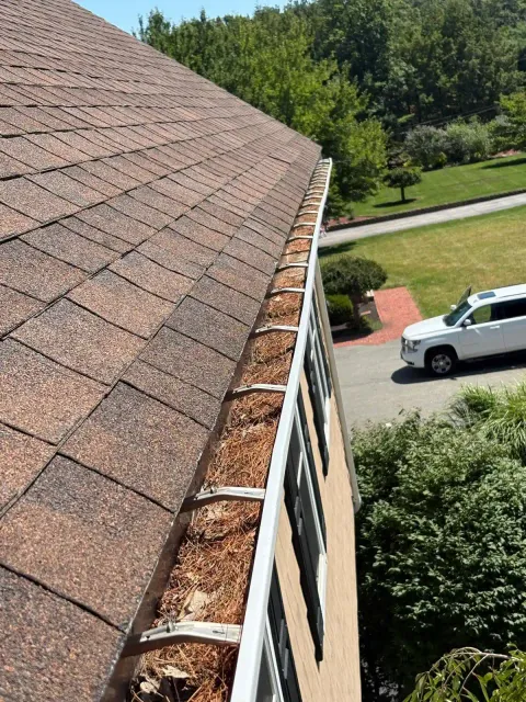 Before: old gutter on the same house