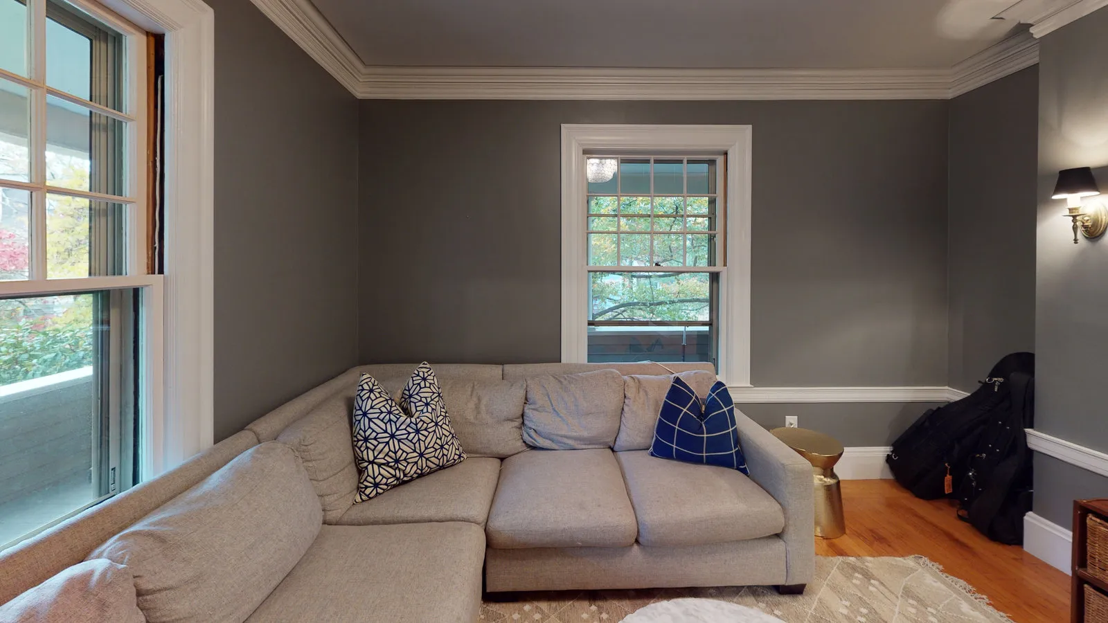 Sitting room with restored trim and crown moulding