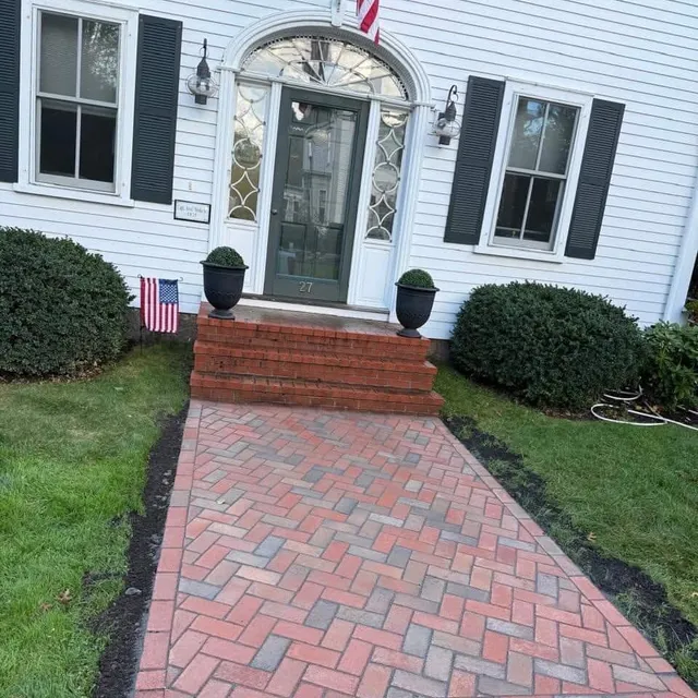 New brick paver front walkway and steps