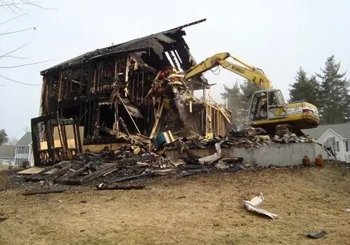 Burned House Being Demolished — Paving Services in Nashua, NH
