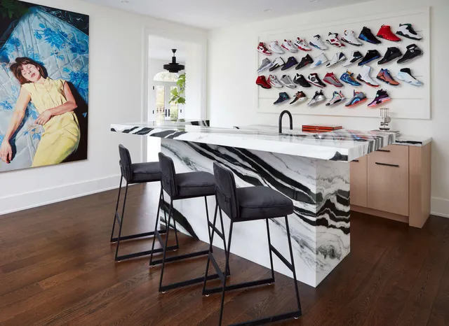 Image of an interior remodel with a bar and wood floors by TR Design-Build