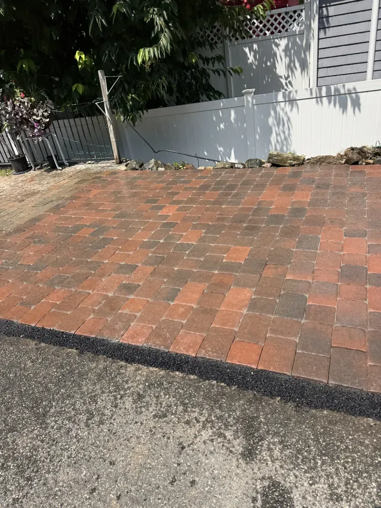 Completed brick paver driveway apron