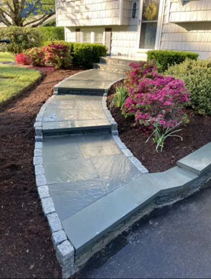 Bluestone walkway with cobble border
