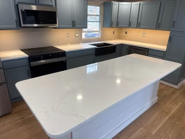 Quartz kitchen island countertop installed by Precision Granite Works — precise templating result in NH