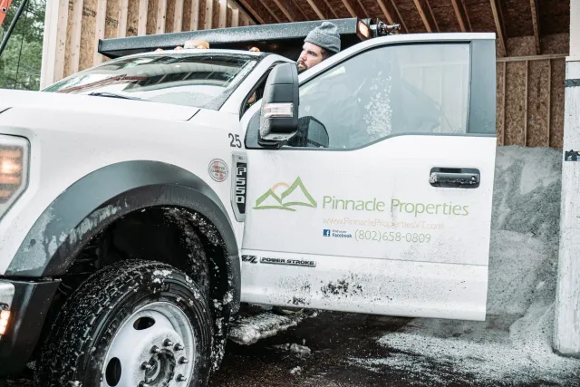 Pinnacle Properties vehicle ready for snow removal services, ensuring reliable winter property care in Vermont.