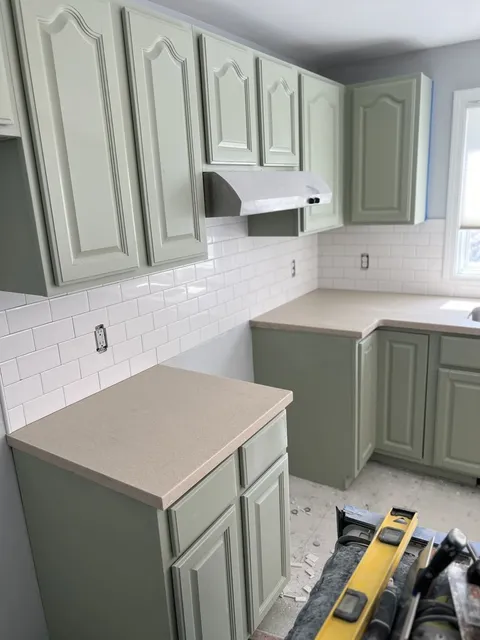 Sage Green Kitchen Cabinets Under Construction