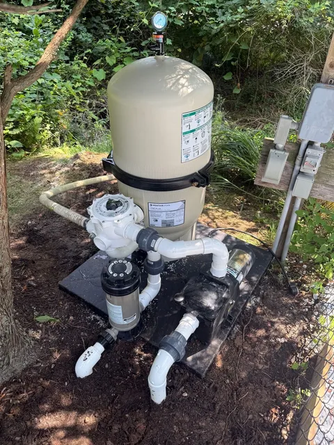 New DE filter and plumbing installed on a fresh equipment pad