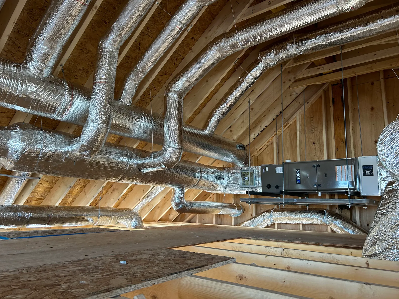 Mitsubishi Heat Pump installation in the South Shore by East Coast Air. Verified for $16k Mass Save Rebate.