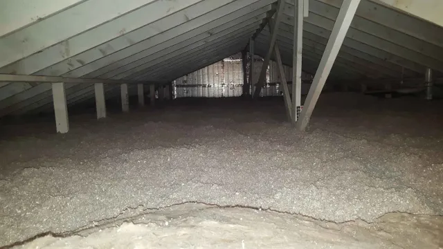 Attic insulation installed in Franklin Massachusetts home to improve energy efficiency and reduce heat loss.