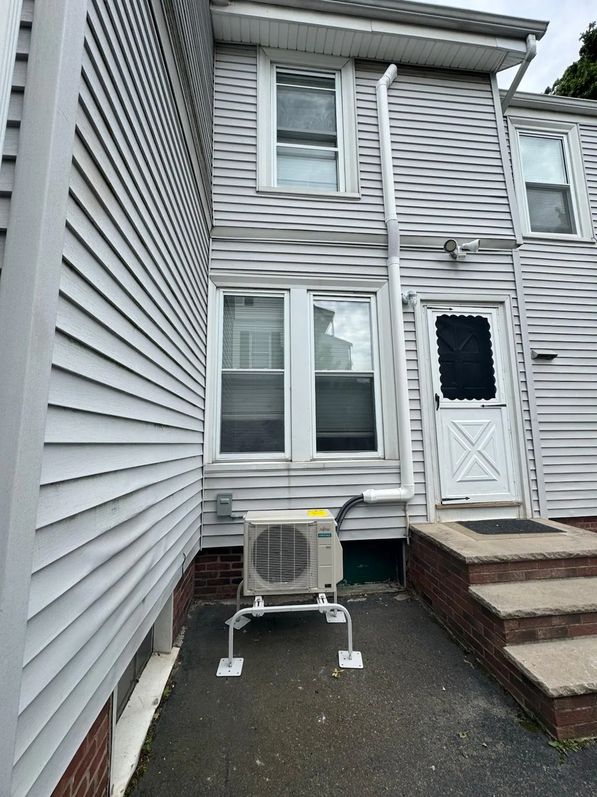 Modern energy-efficient outdoor compressor for home AC