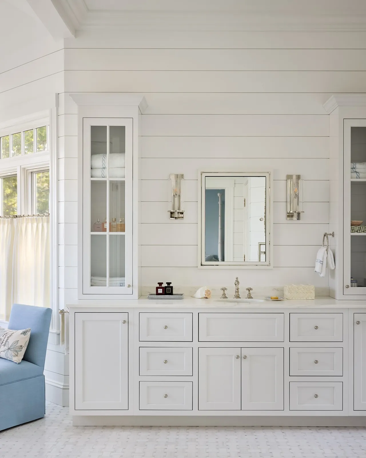 No two bathrooms in this Harwich Port renovation tell the same story. Each space was given its own distinctive character through custom cabinetry and millwork—from crisp inset vanities and louvered doors to soft coastal colors, tailored storage and carefully scaled trim. Curated by interior designer Ariel Okin, the combination of expressive patterns, refined materials and finely crafted details gives every bathroom a sense of individuality while maintaining a cohesive, elevated feel throughout the home.

Explore more of this major renovation on our website. 

Interior Design: @arielokin
Photography: @donnadotanphoto

#CapeAssociates #HarwichPort #CapeCodRenovation #CustomCabinetry #CustomMillwork #BathroomDesign #LuxuryInteriors #InteriorCraftsmanship #CapeCodHomes #HomeRenovation