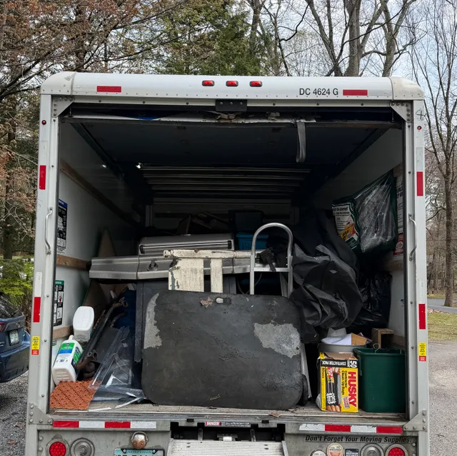 TrueNorth Cleanouts truck loaded after a cleanout in Kingston NH