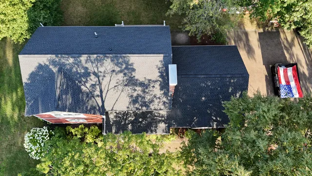 Protecting flowers in Reading MA📍 Rybo Roof Replacement is the only way. #roofing #wecare #homeimprovement #dumpster