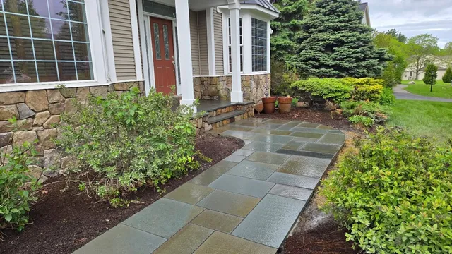 Bluestone walkway and entryway refresh for this beautiful home. Refresh laid some of the deteriorating cultured stone as well!