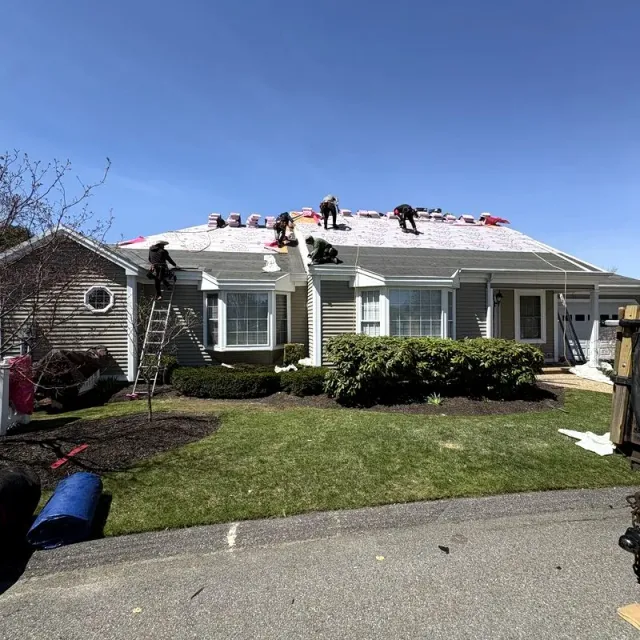 A-Z Roofing crew mid-project on a ranch home