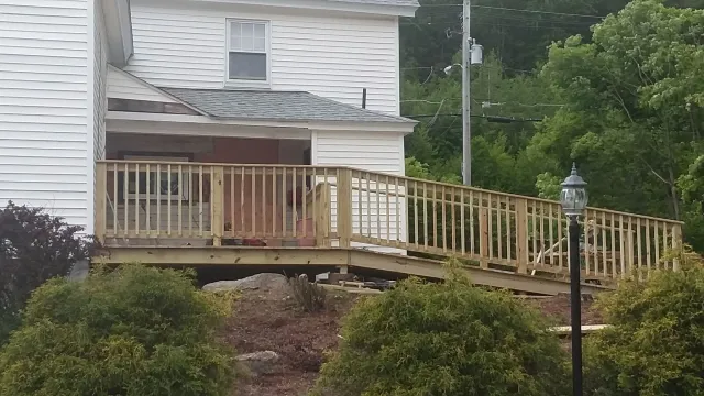 a handicap ramp and deck built at a hotdog restaurant in Barre Ma