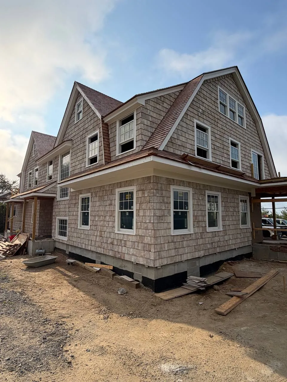 Construction progress on cedar roof and sidewall installation