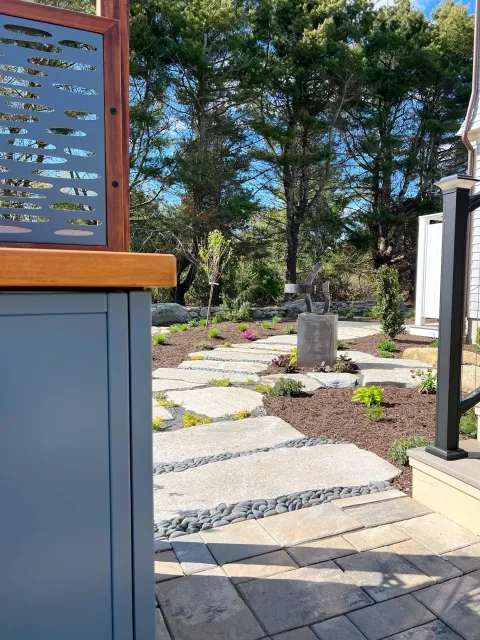 inviting garden path with river stone.JPG