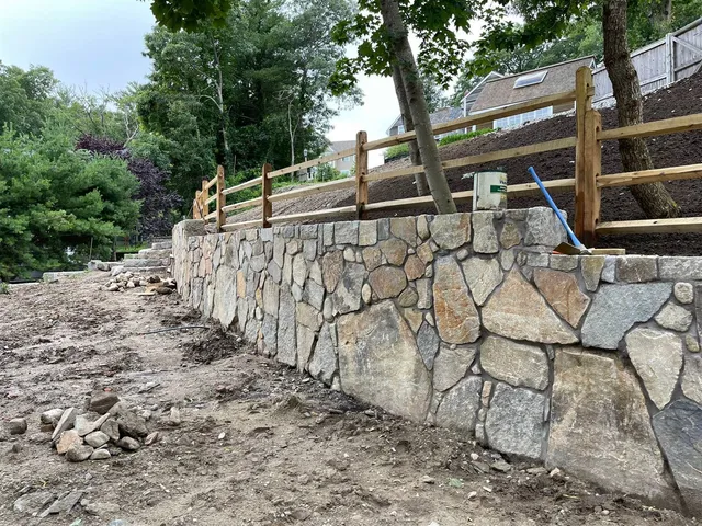 Stone and block retaining wall in Massachusetts