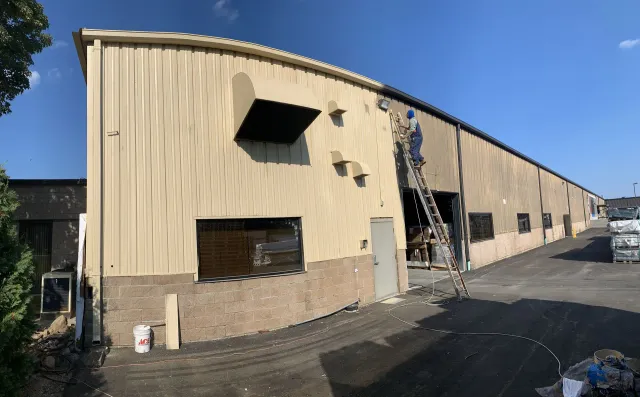 Commercial Warehouse exterior painting by Pioneer Painters