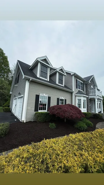 Full foundation planting, colonial home