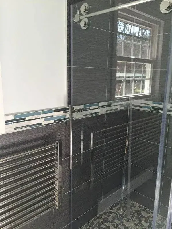 Tiled shower with towel warmer