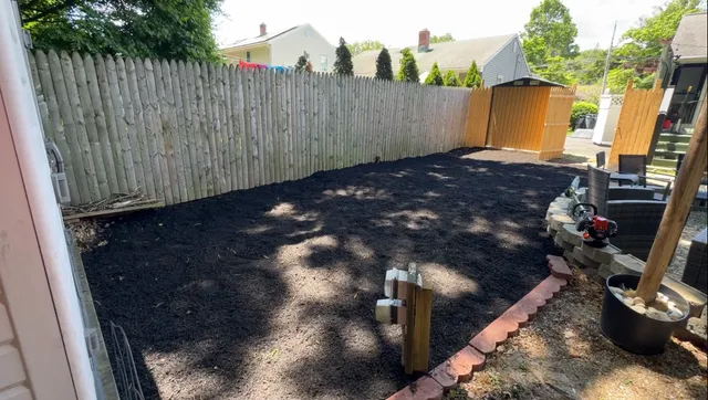 After — fresh black mulch installation by Sebs Landscaping & Masonry CT