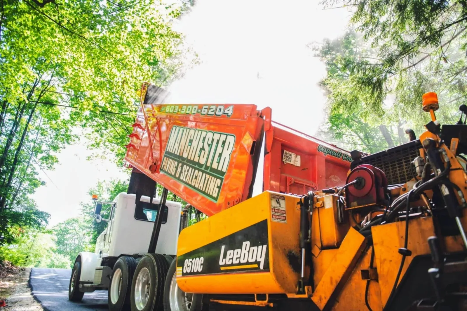 work photo from manchesterpavingandsealcoating.com