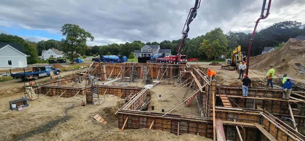 A group of people are working on a construction site.