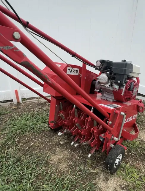 Core aeration equipment used by Sebs Landscaping & Masonry for lawn aeration in Fairfield County CT