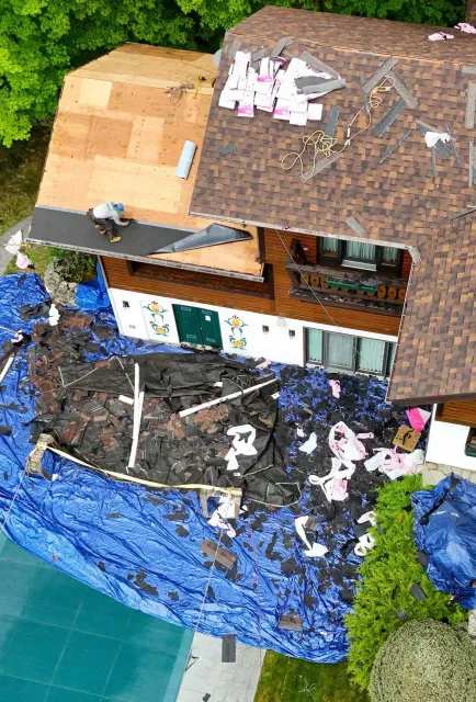 work photo from threemountainroofing.com