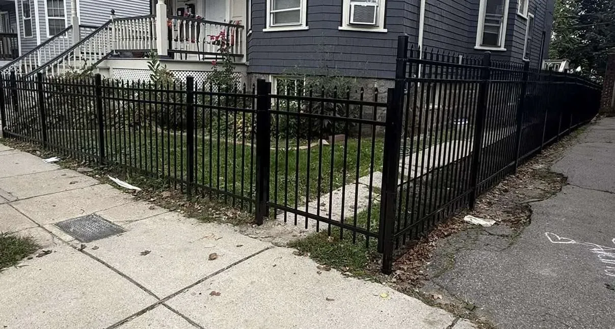 Black aluminum fence installation by The Right Fence