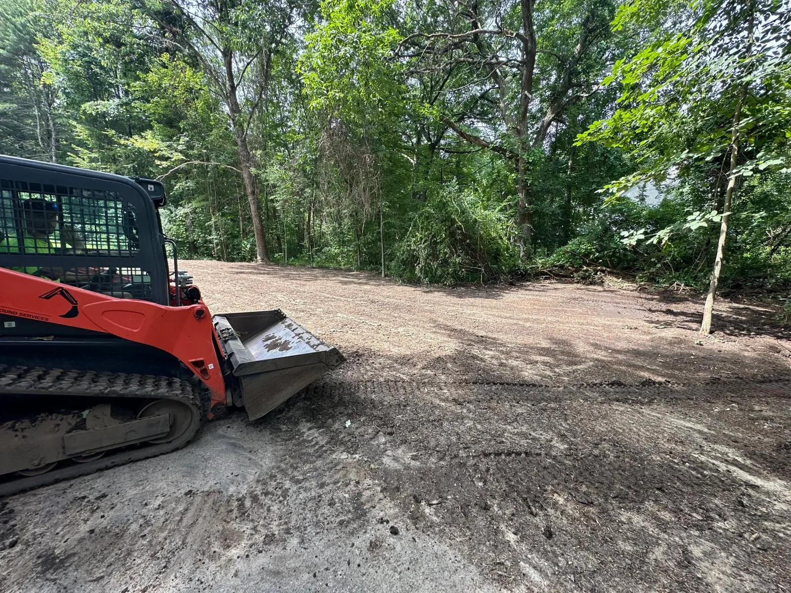 Grading and leveling service in Westford, MA for improved drainage by Gardner’s Landscaping, LLC