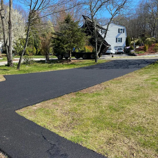 work photo from dmgtruckingpaving.com