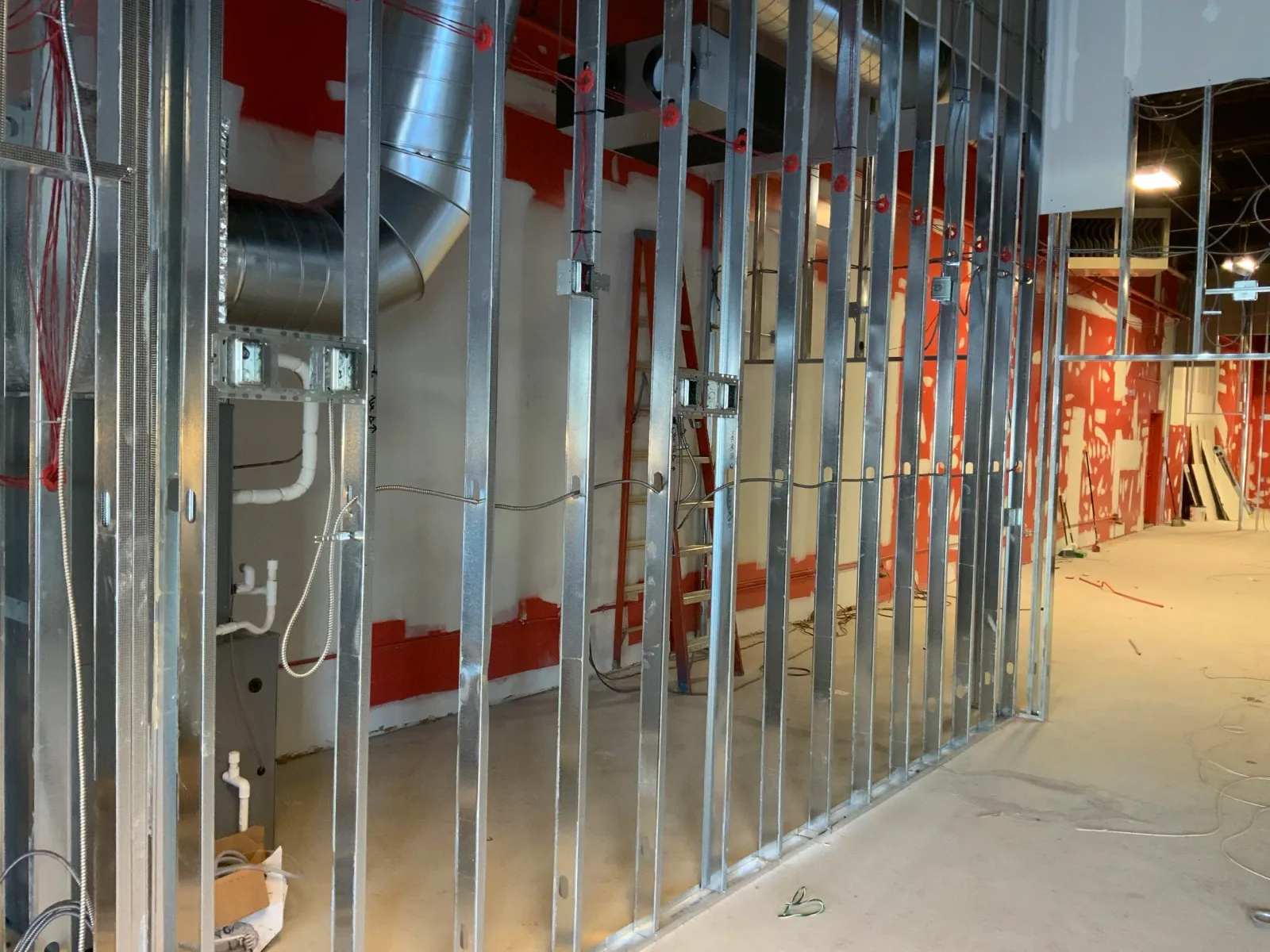 Construction site with metal framing and ductwork