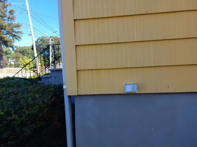 New exterior service conduit and outlet on siding