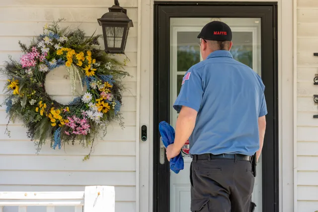 Maffei technician arriving at a customer's door with shoe coverings